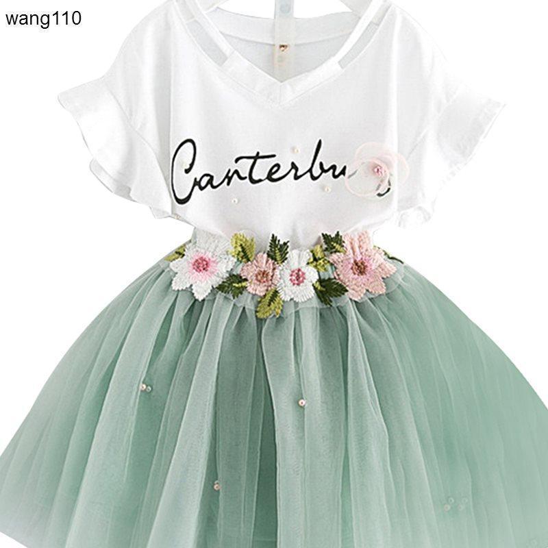 Girls green tee & ripped pants set