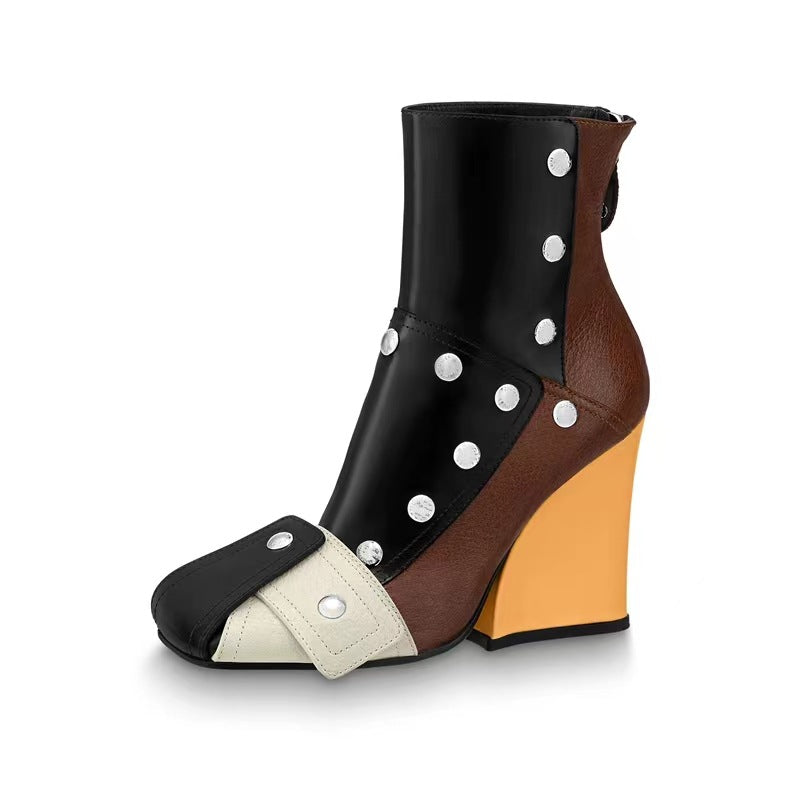 Women's orange studded ankle boots