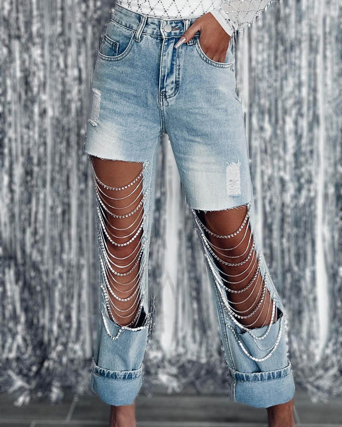 Women's chain ripped jeans