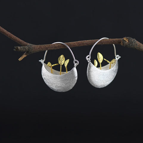 Women's gold silver separation earrings