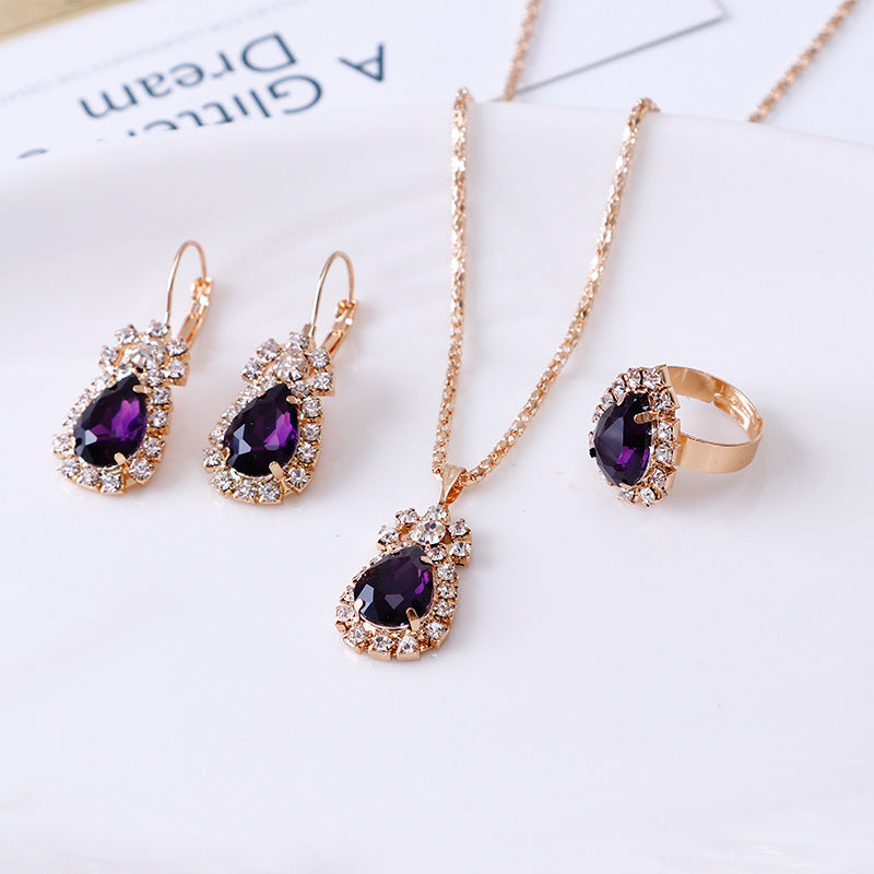 Women's dark purple necklace earrings & ring