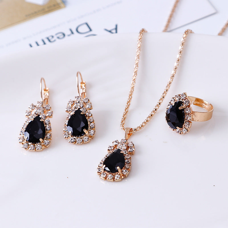 Women's black necklace earrings & ring