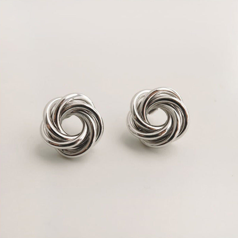 Women's silver flower hollow earrings