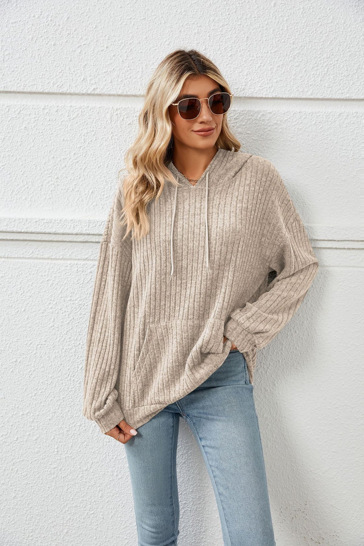 Women's light gray hooded knit sweater