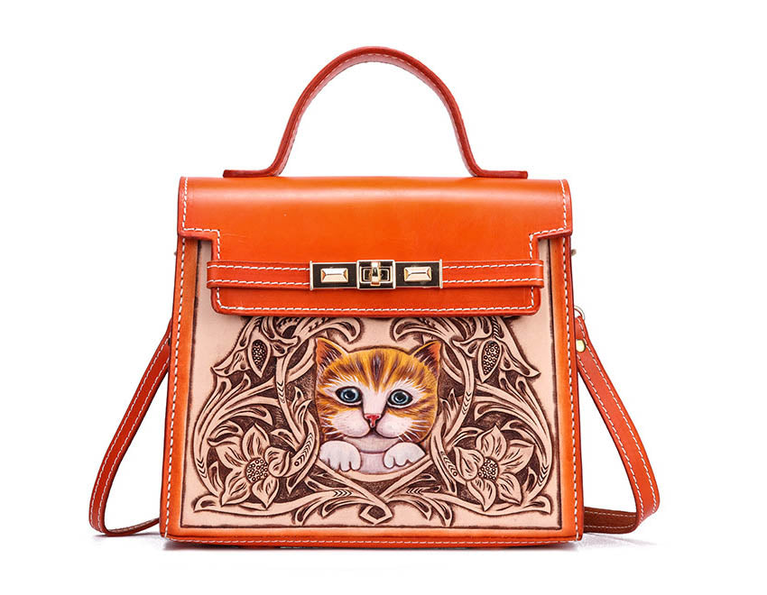 Women's engraved cat cowhide handbag
