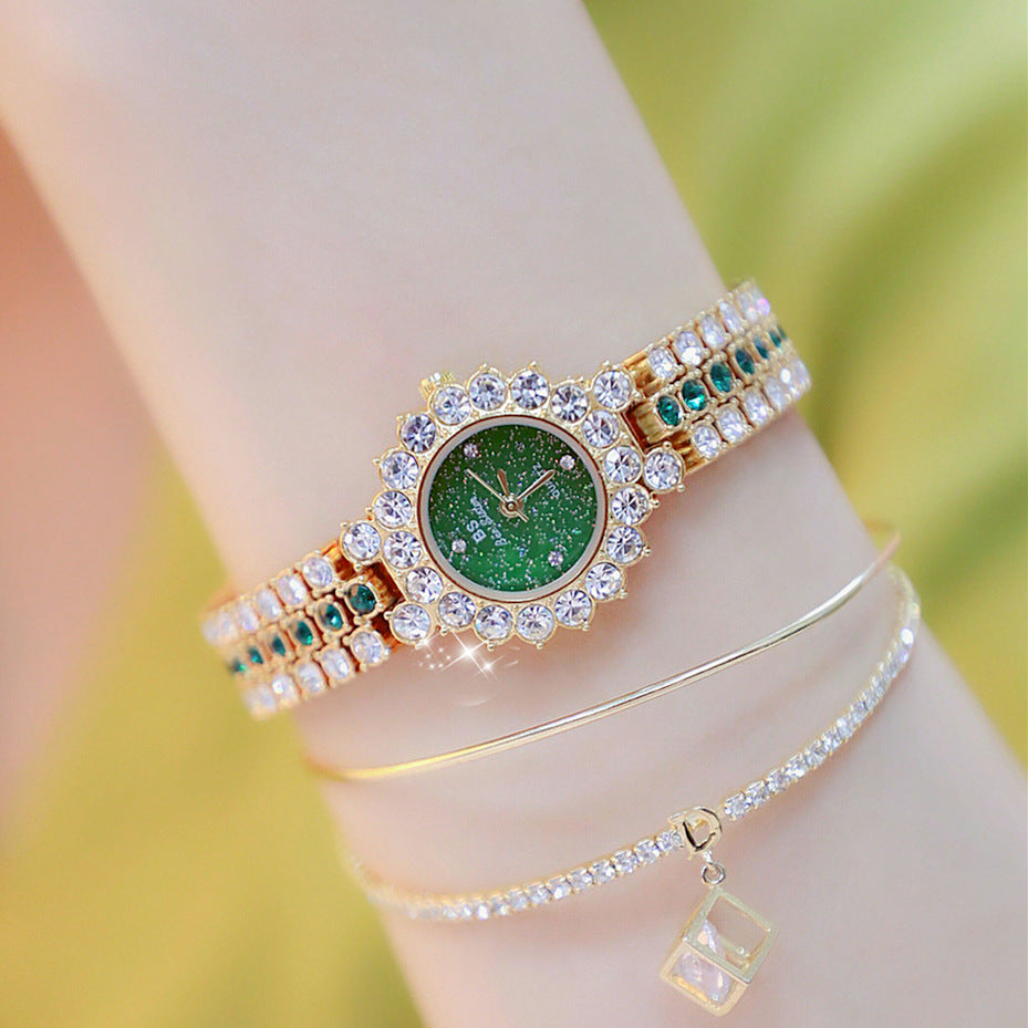 Women's golden green watch