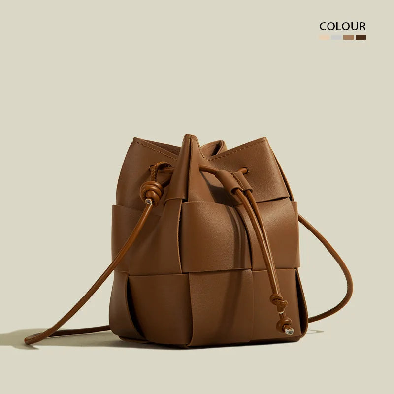 Women's brown woven bucket bag