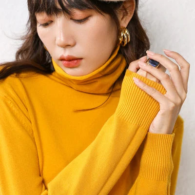 Women's bright yellow turtleneck sweater
