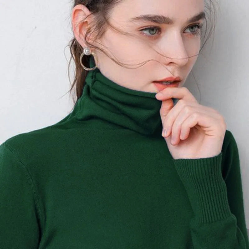 Women's dark green turtleneck sweater