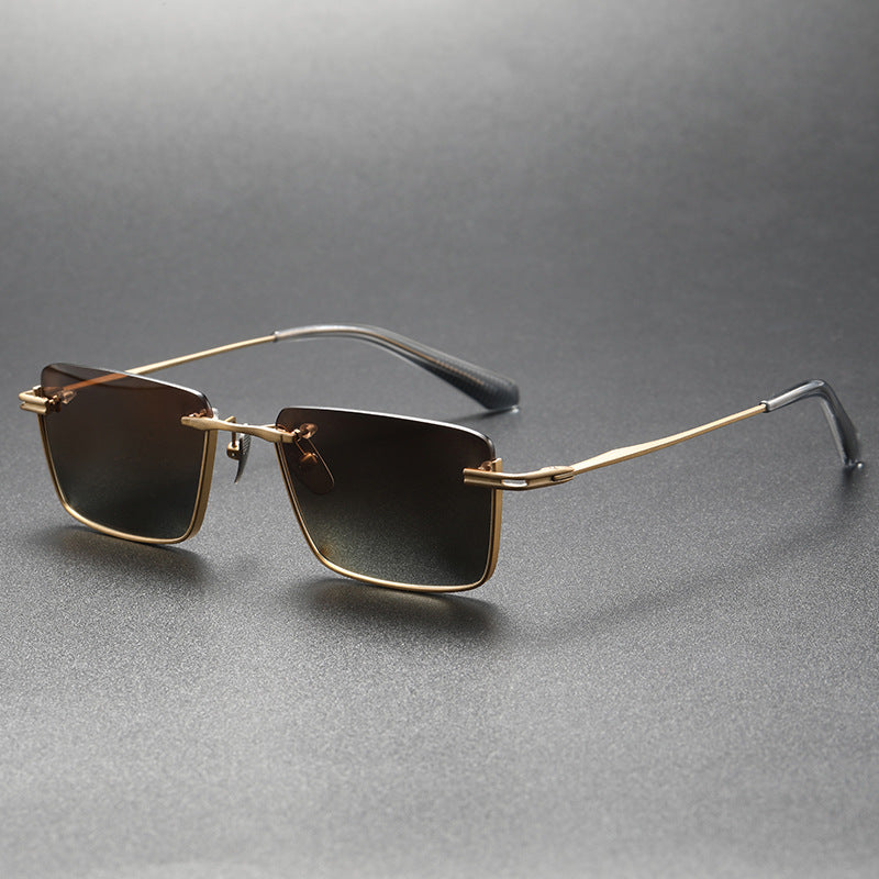 Women's golden frame gradually tea titanium sunglasses