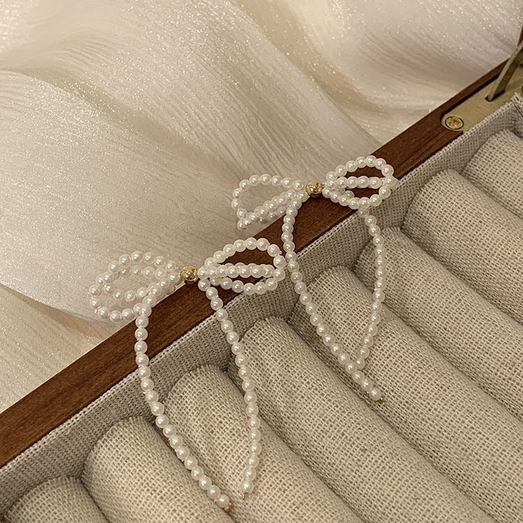 Alternate view: Women's pearl bow earrings