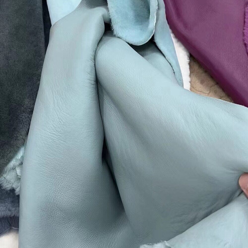 Women's hooded lamb fur jacket