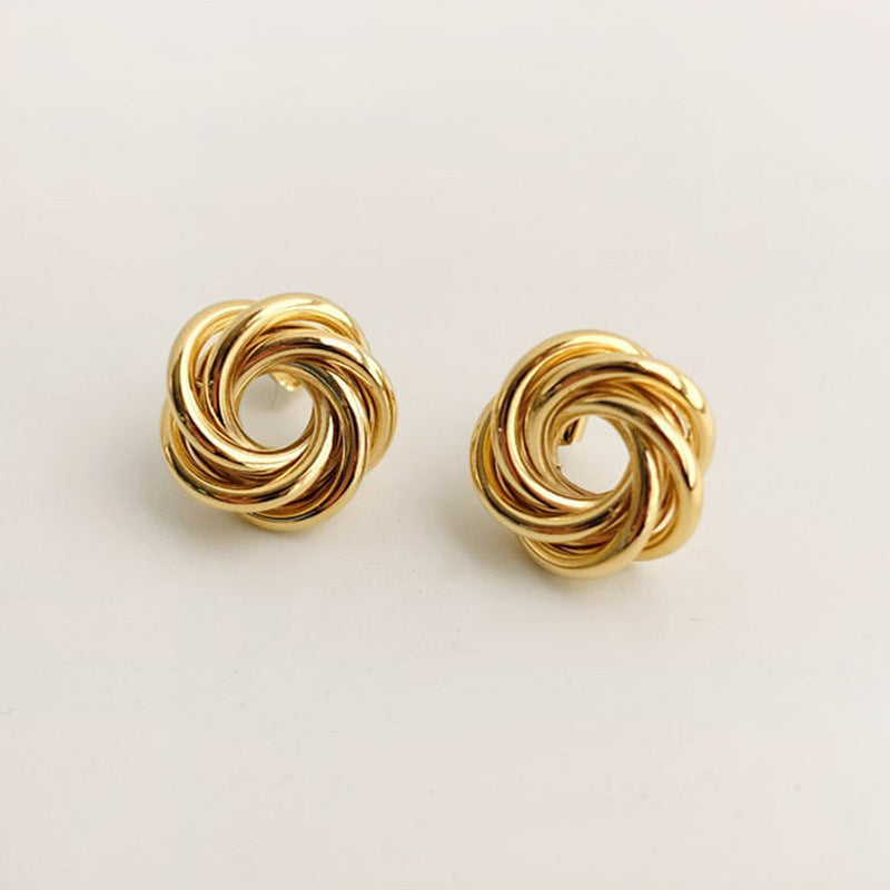 Women's gold flower hollow earrings