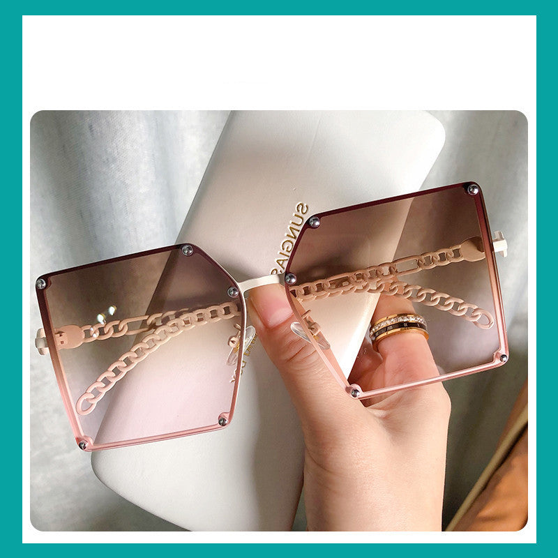 Women's pink frameless sunglasses