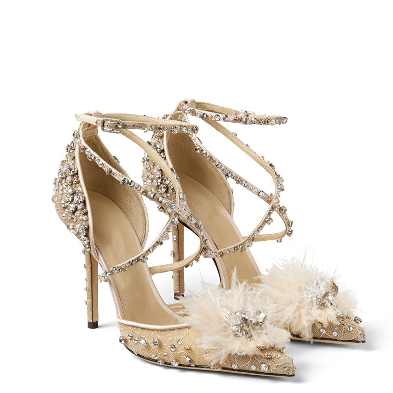 Women's nude rhinestone pumps