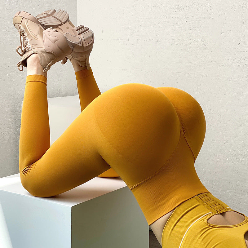 Women's yellow hip lifting leggings