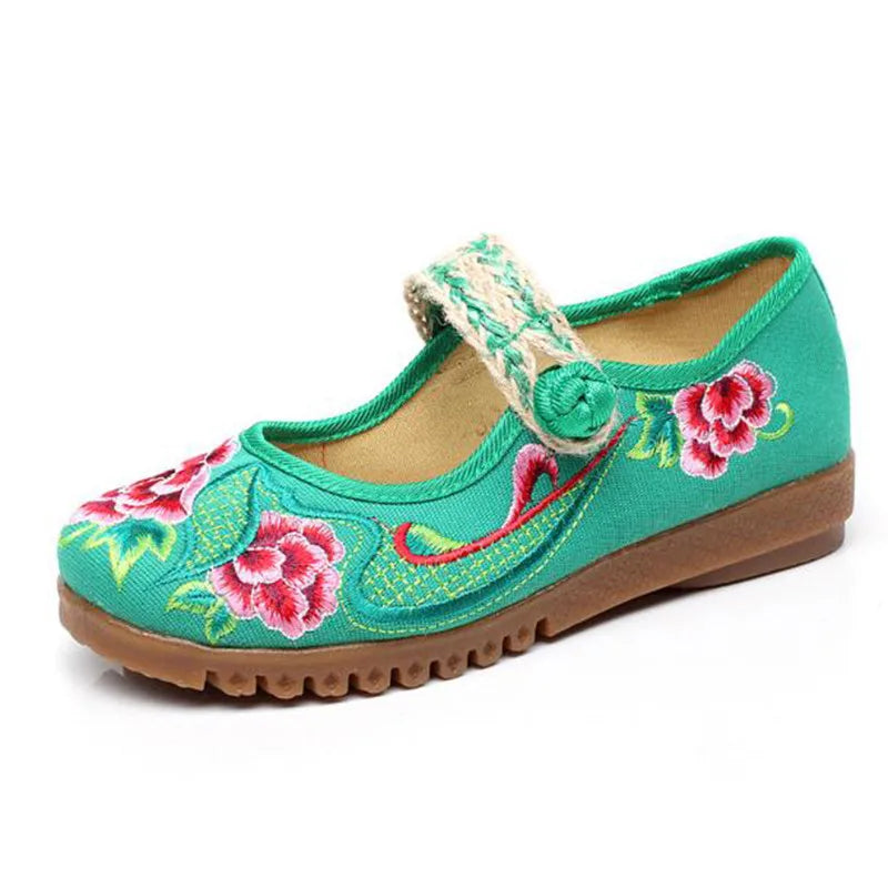 Women's green buckle strap flats