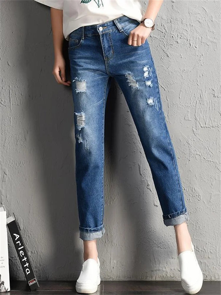 Women's mid-rise ripped jeans