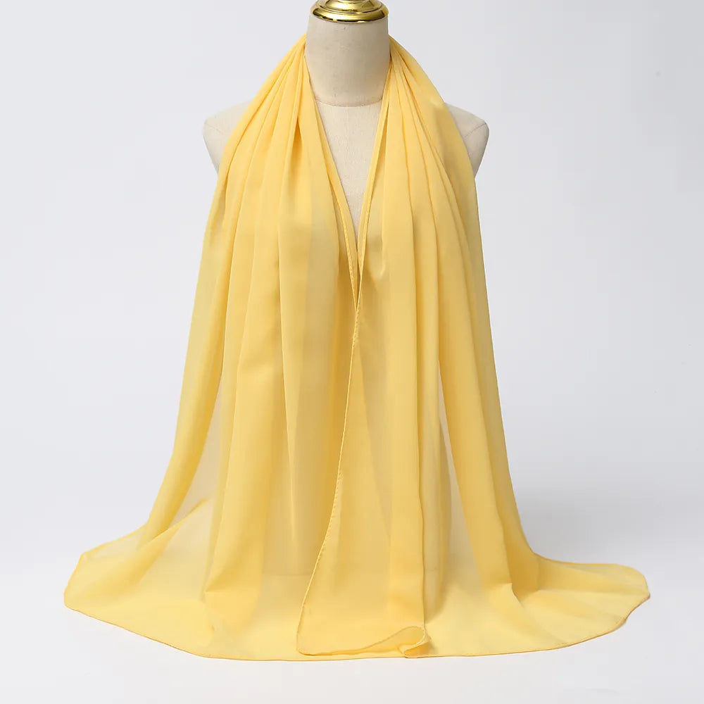 Women's bright yellow chiffon hijab scarf