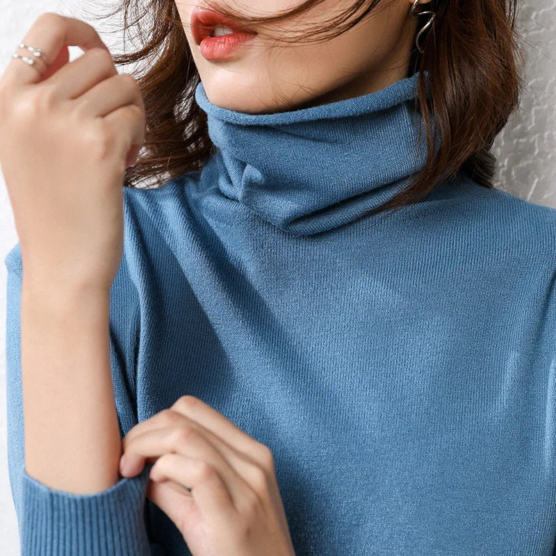Women's blue turtleneck sweater