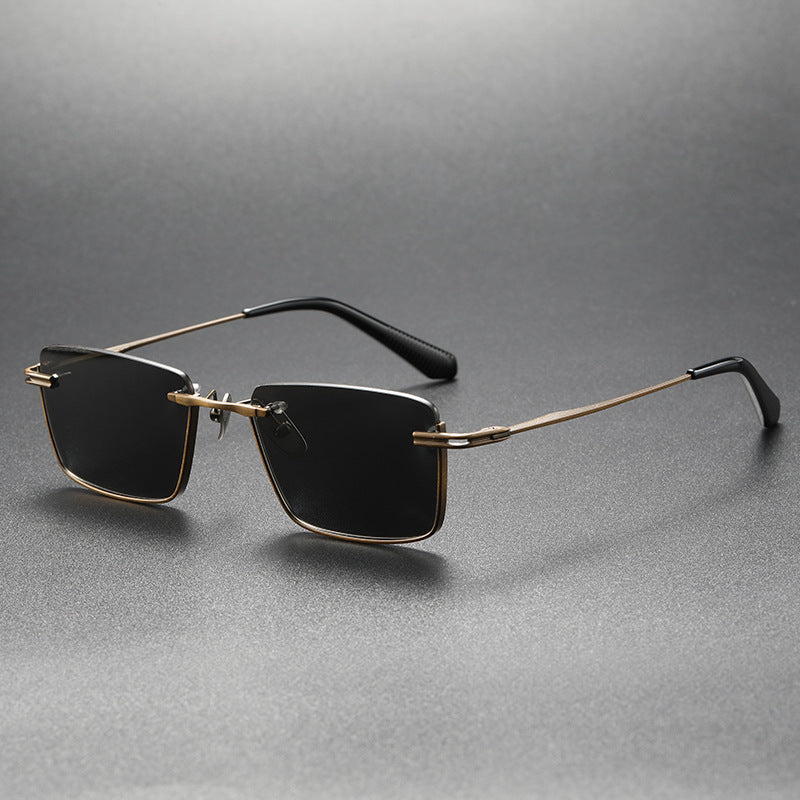 Women's bronze frame black and gray titanium sunglasses