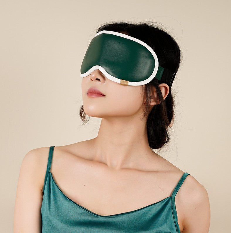 Women's green heated steam mask