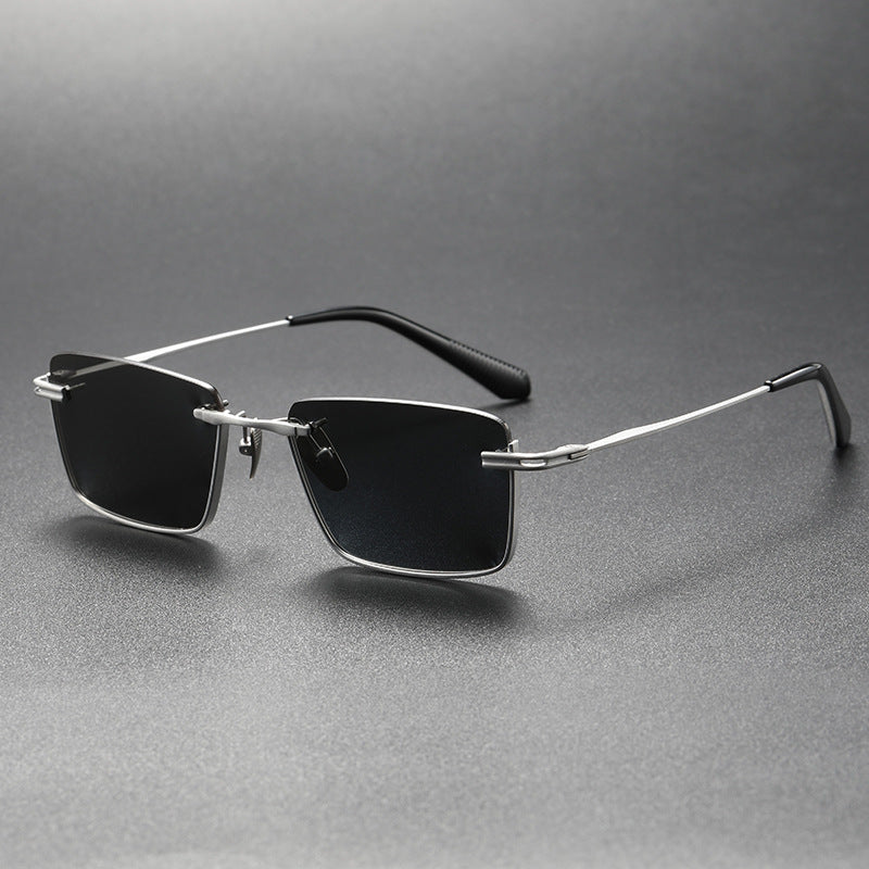 Women's silver frame black and gray titanium sunglasses